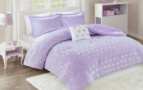 Juliette Twin/Twin XL 3-piece comforter set in plush purple polyester with silver metallic hearts, pompom-trimmed decorative pillow, glam style