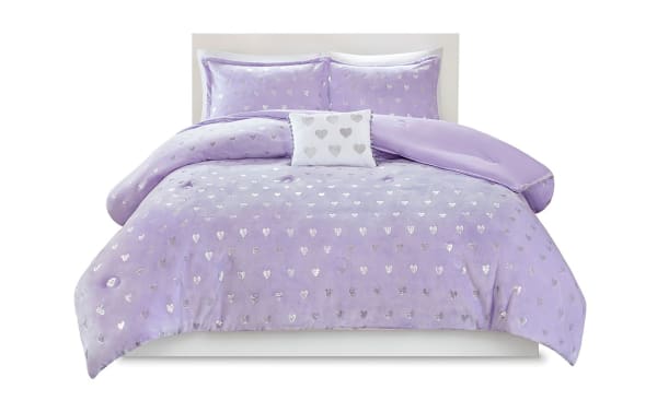Juliette Twin/Twin XL 3-piece comforter set in plush purple polyester with silver metallic hearts and a white decorative pillow with silver hearts and pompom trim, glam style, OEKO-TEX certified for safe, comfortable bedding.