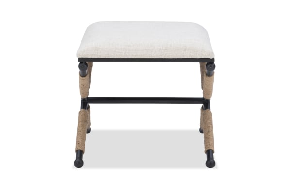 Traditional April White Upholstered Vanity Stool with white cotton-blend fabric seat, foam cushion, and black iron X-shaped frame with rope-wrapped legs.