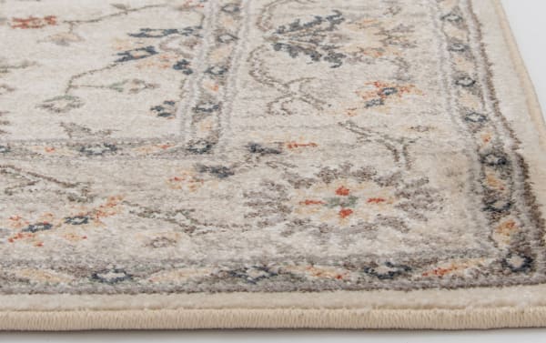 Transitional Sandra 2' x 3' beige oriental rug with cream, brown, gray, orange, and blue floral pattern, made of durable polypropylene.
