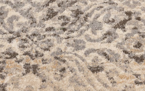 Transitional Morall 2' x 8' gray Ikat runner rug with cream and yellow accents, soft polypropylene yarn, intricate pattern, durable and stain-resistant.