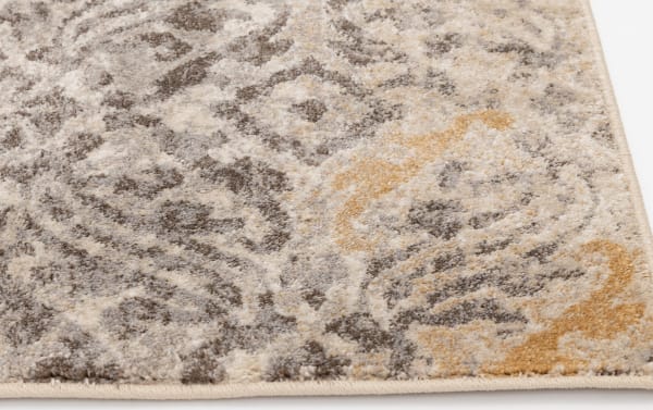 Transitional Morall 2' x 8' runner rug with gray, cream, and yellow ikat pattern, made of durable, stain-resistant polypropylene.