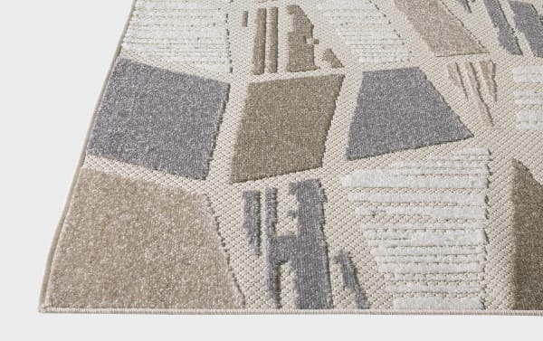 Miller 3' x 5' transitional rug in beige, gray, brown, and cream with geometric patterns, durable stain-resistant polypropylene fibers.