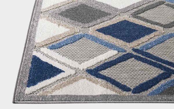 Aygon 2' x 3' gray geometric indoor/outdoor rug with blue, beige, and white diamond patterns, made of durable polypropylene.
