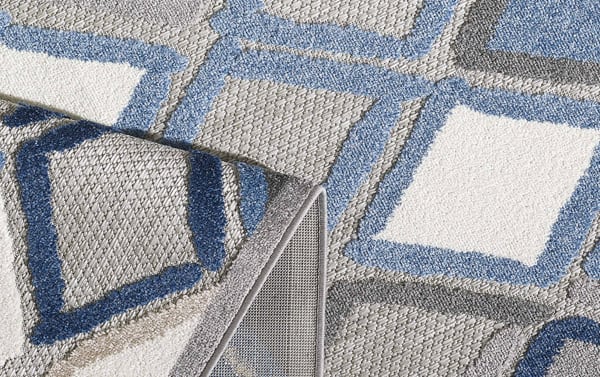 Gray geometric indoor/outdoor rug with blue, white, and beige accents, made of durable polypropylene in a transitional style.