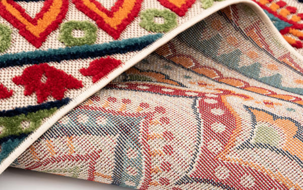 Mathis 6' x 9' Multi Medallion indoor/outdoor rug in multicolored polypropylene with vibrant red, blue, yellow, green, and orange geometric medallion patterns, featuring a transitional style and durable, stain-resistant weave ideal for living spaces, dining areas, or decks.