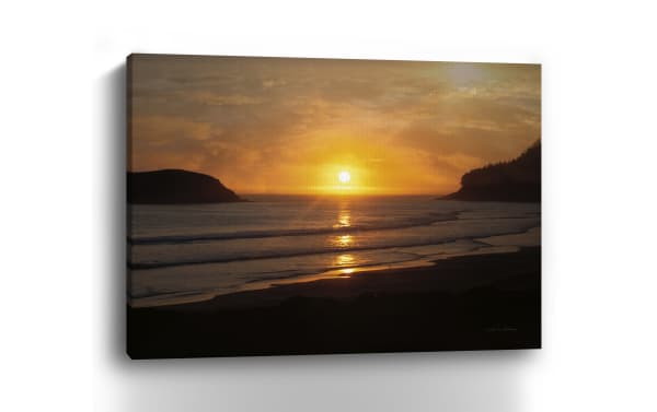 Ocean Sunset Canvas Wall Art features a multicolored transitional design with a vibrant sunset over ocean waves, printed on thick polyester fabric and hand-stretched over solid pine for durability and warp resistance.