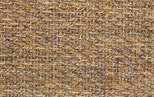 Rustic brown Saba 5' x 8' indoor/outdoor rug with textured polypropylene weave mimicking natural seagrass for durable, easy-care flooring.