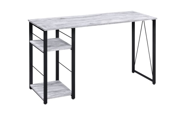 Contemporary Arlo White Writing Desk with large whitewashed composite wood surface, black metal frame, and two open storage shelves for books or devices.