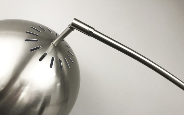 Brushed steel adjustable arm of Eanora 78'' Mid-Century Modern arc floor lamp with vented shade for overhead lighting.
