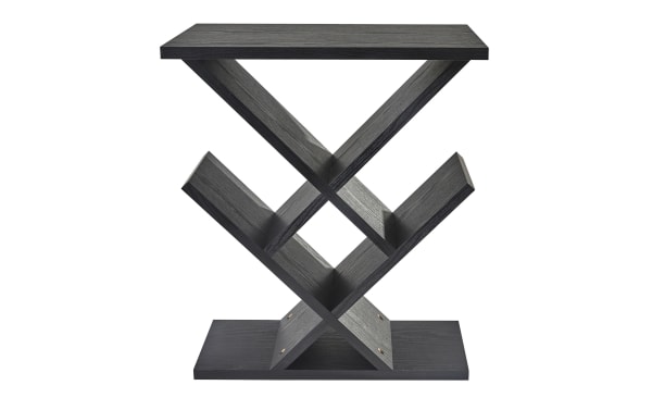 Calverson 19'' Black Accent Table in contemporary style with black wood grain MDF, steel, concrete, and plastic. Features intersecting X-shaped design with 8” deep storage slots for media and devices, suitable for living room or bedside use.