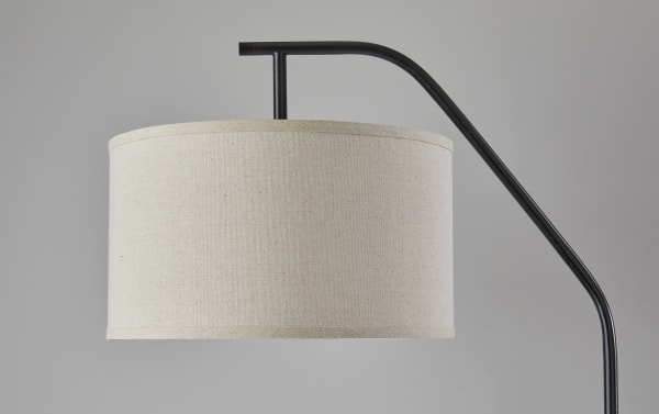 Regina 66'' black steel floor lamp with arching pole and 16" round beige oatmeal linen fabric shade, transitional style with metal rotary switch.