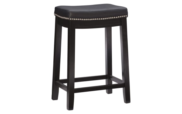 Ryann Black Faux Leather Backless Counter Height Stool with nailhead trim, rubberwood frame, and cushioned polyurethane seat in traditional style.