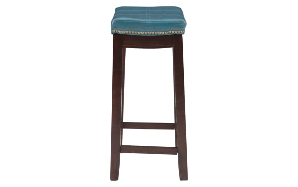 Ryann Blue Faux Leather Backless Upholstered Counter Height Stool with blue polyurethane seat, antique brass nailhead trim, and dark rubberwood frame in traditional style.