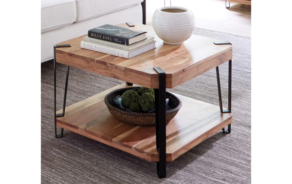 Rustic Archer Natural Live Edge Coffee Table with solid acacia wood tops, black metal frame, and unique wood grain patterns.