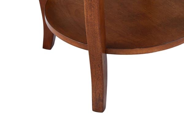 Transitional Loudain Brown Round Table with MDF and rubberwood solids, featuring a smooth brown finish, round shape, and tapered cabriole legs.