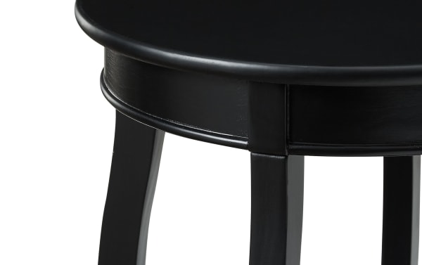 Loudain Black Round Table with transitional style, MDF and rubberwood solids, featuring a black finish and tapered saber cabriole legs.
