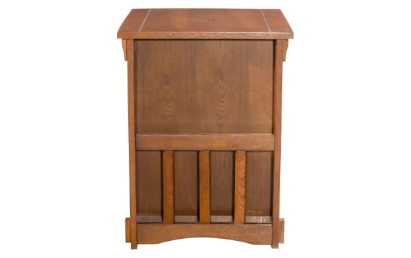 Christy Brown Storage Cabinet Side Table in transitional style, made of brown particle board, MDF, and rubberwood solids with carved details and magazine slot.