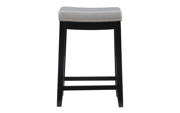 Cielo Gray faux leather backless counter stool with gray polyurethane upholstered seat, silver nailhead trim, and black rubberwood frame in transitional style.