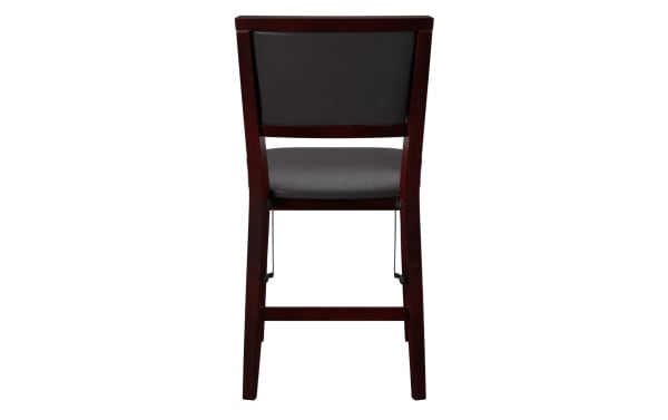Kingsley Espresso faux leather upholstered folding dining chair in brown with rubberwood frame, padded seat, and transitional style, shown from back.