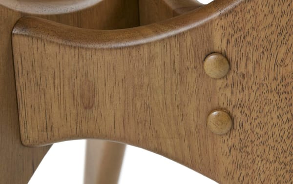 Close-up of the Derby Natural Solid Wood End Table’s mid-century modern cross base in natural elm wood finish with visible wood grain and rounded wooden dowels.