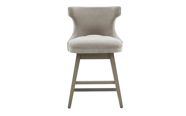 Kaya Light Gray Upholstered Counter Height Swivel Stool with solid wood legs, light gray fabric, low back, and matte silver metal kickplate in transitional style.