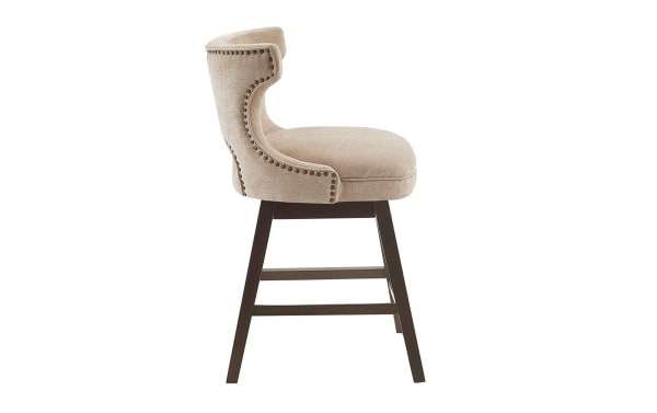 Beige Kaya Upholstered Counter Height Swivel Stool with solid wood legs, fabric seat, transitional style, and pewter nail head trim.