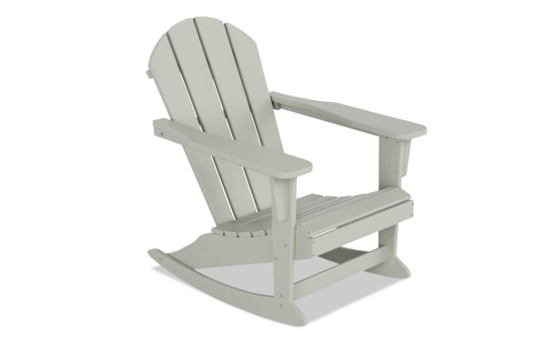 Outdoor Sand Rocking Adirondack Chair in white high-density plastic with a transitional style, featuring wide armrests and curved rockers for smooth swaying.