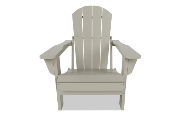 Outdoor Sand Folding Adirondack Chair in white high-density plastic with a transitional style, featuring wide armrests and a slatted back.