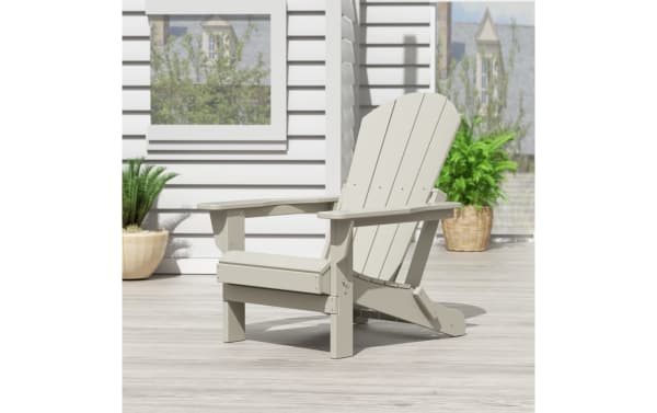 Outdoor Sand Folding Adirondack Chair in white high-density plastic with transitional style, featuring a slatted back and foldable design for easy storage.