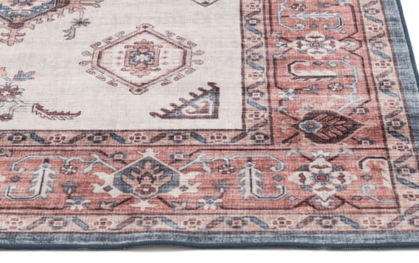 Transitional Teller 5' x 7' washable rug in red and beige polyester fabric, featuring a detailed oriental border and geometric medallions.