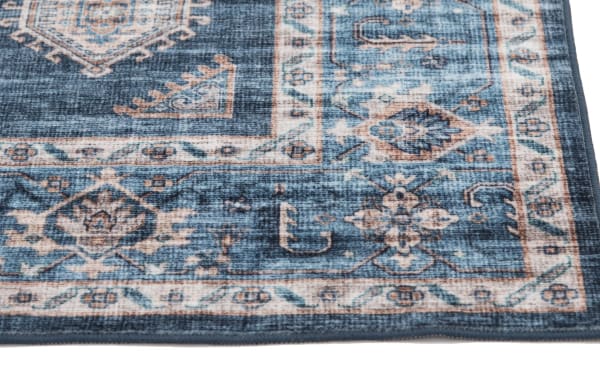 Navy and light blue Teller 8' x 10' Oriental washable rug with ivory accents, transitional style, polyester fabric, stain- and water-resistant design.