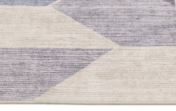 Kwesi 8' x 10' Purple Oriental washable rug with beige and blue geometric pattern, transitional style, durable polyester fabric, stain-resistant and machine washable.
