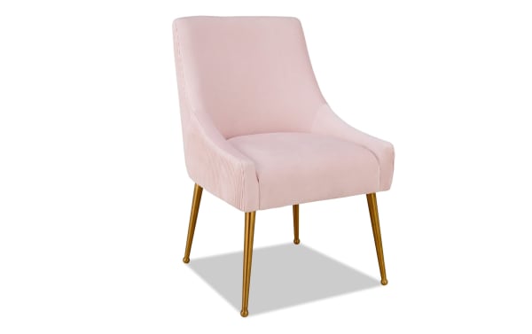 Contemporary Giselle II blush pink velvet dining chair with solid pine frame, gold stainless steel legs, and plush upholstered back.