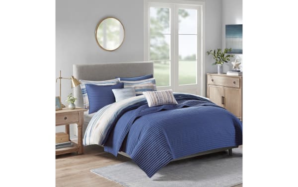 Lucas Full/Queen Blue Abstract 8 Piece Comforter Set with microfiber fabric, blue and white hues, transitional style, includes lightweight blanket and decorative pillows.