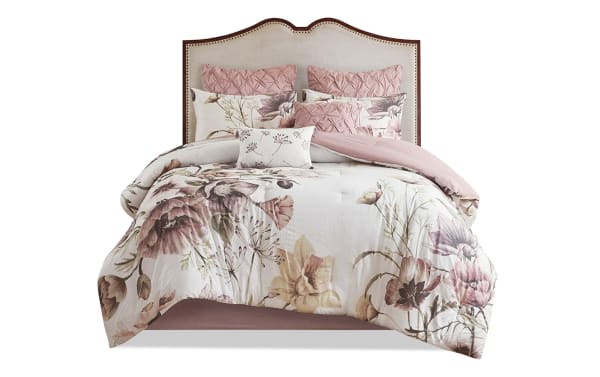 Emily King Pink Floral 8 Piece Comforter Set featuring a transitional style cotton and polyester blend with pink and white floral design and textured pillows.