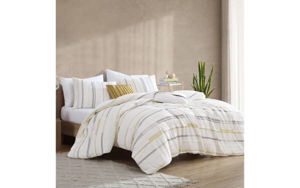 Ezra Queen Ivory Striped 5 Piece Comforter Set with soft woven cotton and polyester fabric, featuring ivory, gold, and gray stripes in a transitional style.