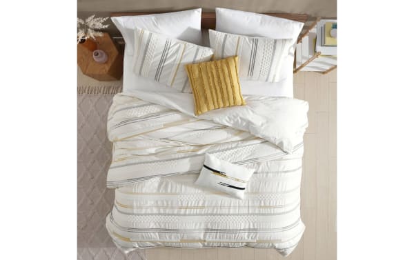 Ezra Queen Ivory Striped 5 Piece Comforter Set with soft ivory, gold, and gray cotton fabric featuring woven stripes and boucle textures in transitional style.
