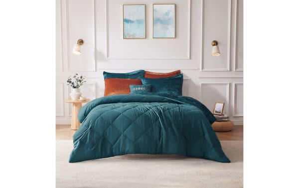 Hawken Twin/Twin XL teal velvet reversible 3-piece comforter set with plush microfiber, rich blue fabric, glam style, and textured decorative pillows.