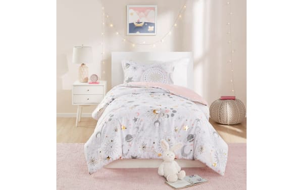 Despia Starry Sky Twin reversible 3-piece comforter set in white microfiber with gold and pink celestial prints, featuring moons, stars, and planets.