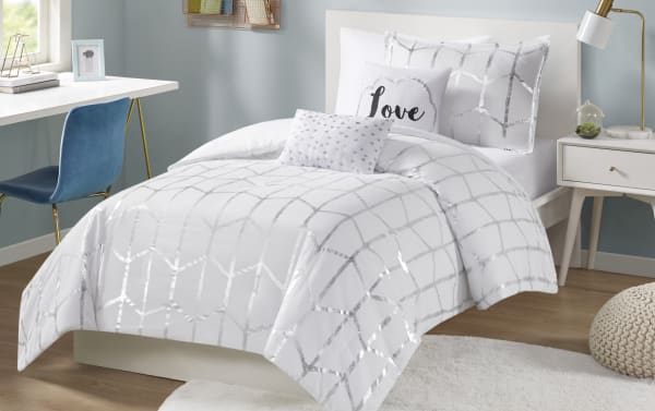 Tina Twin/Twin XL White Geometric 4 Piece Comforter Set with silver metallic geometric and polka dot prints on white polyester microfiber fabric, contemporary style.