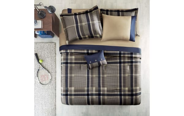 Roderic Twin Taupe Plaid 7 Piece Comforter Set in taupe, navy, and white microfiber fabric with transitional plaid design, includes shams and sheets.