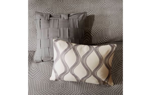 Humphrey King Gray Geometric 9 Piece Comforter Set with gray polyester fabric, featuring textured geometric patterns and decorative pillows with embroidered and woven designs.