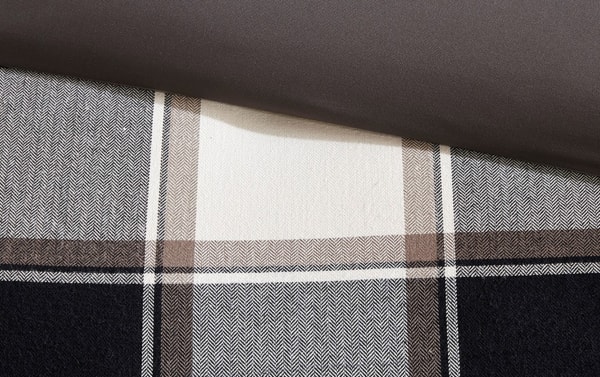 Brown plaid fabric with black and white stripes in a cottage-style cotton blend, part of the Aspen Lodge Queen Brown Plaid 8 Piece Comforter Set.