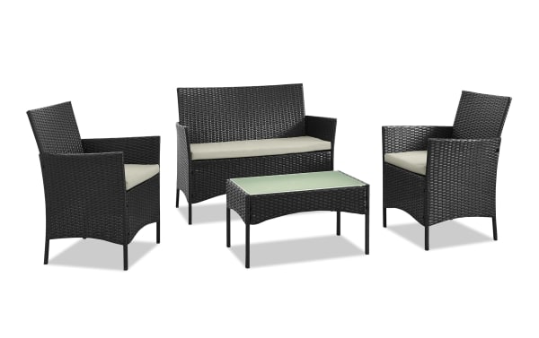 Mikado 4 Piece Cream Wicker Outdoor Conversation Set with two chairs, loveseat, and glass-top coffee table in black rattan with cream polyester cushions, transitional style.