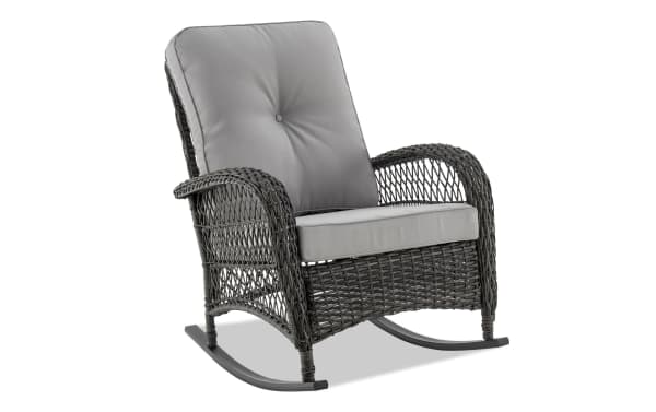 Pianco Gray Wicker Outdoor Rocking Chair with gray polyester cushions, iron and steel frame, transitional style, and classic rattan weave for cozy outdoor seating.