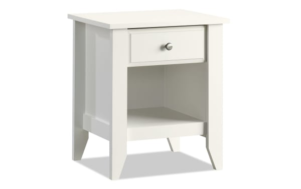 Janis White Nightstand with Drawer, transitional style wood bedside table in white with smooth metal runner drawer and open bottom shelf for storage.