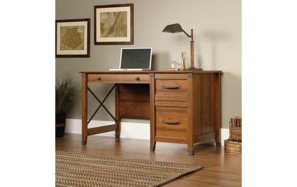 Akila Cherry 3 Drawer Desk in transitional style with warm cherry particle board, metal drawer handles, and safety-stop runners for secure storage.
