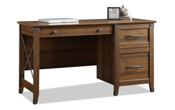 Akila Cherry 3 Drawer Desk in transitional style with warm cherry particle board, metal drawer runners, safety stops, and black metal hardware.