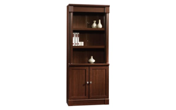 Detlof 71.9'' cherry transitional 2-shelf bookcase in particle board with adjustable shelves, hidden cabinet storage, and slide-on moldings.